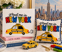 Meet Me in New York needlepoint canvas styled with matching pillow
