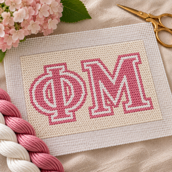 Phi Mu needlepoint canvas featuring ΦΜ letters over rose and white stripes