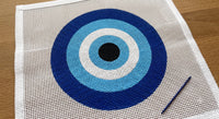 Evil eye needlepoint pillow canvas detail